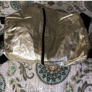 Large gold Victoria’s Secret duffle bag